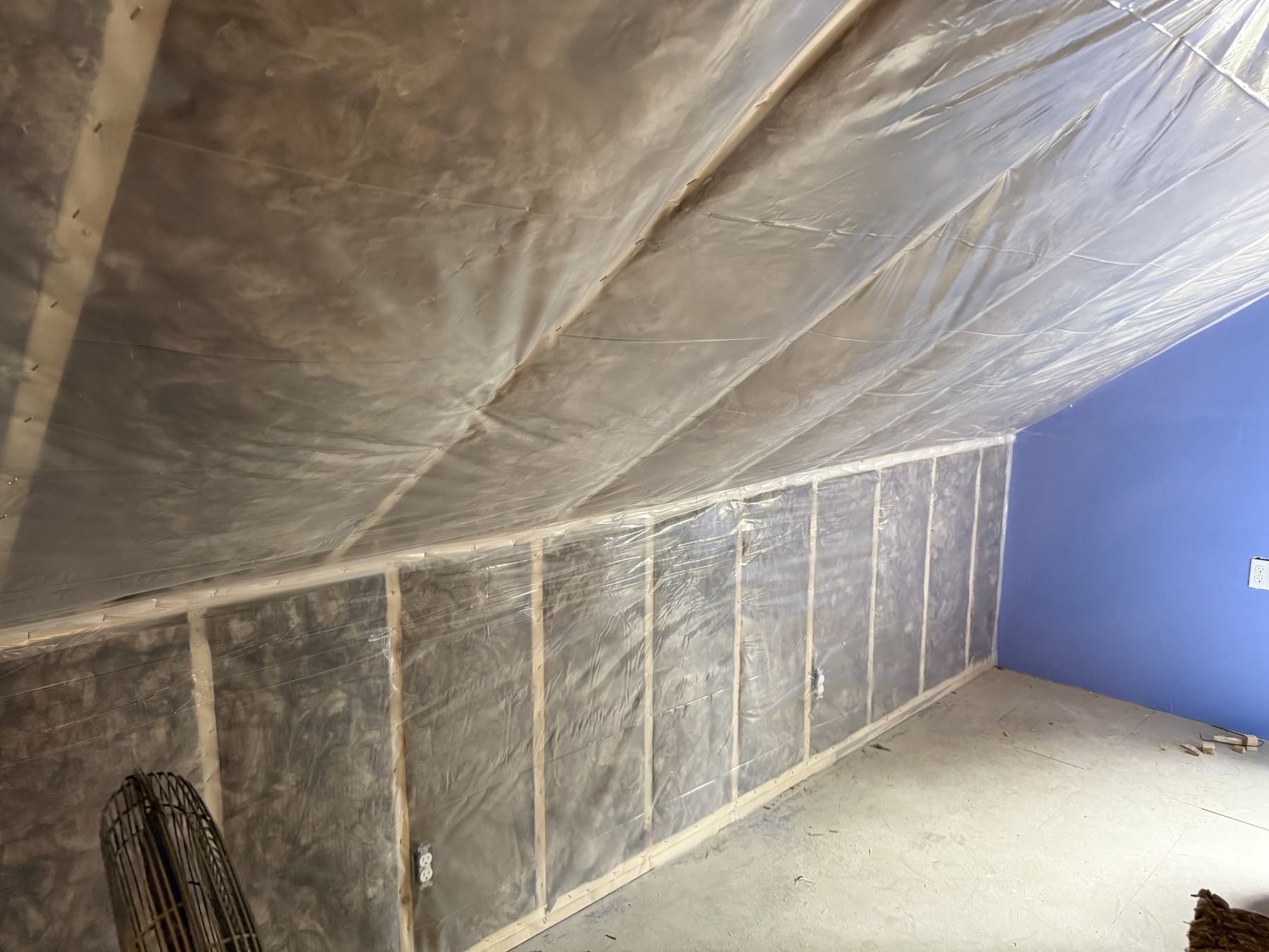Attic insulation with vapor barrier installed