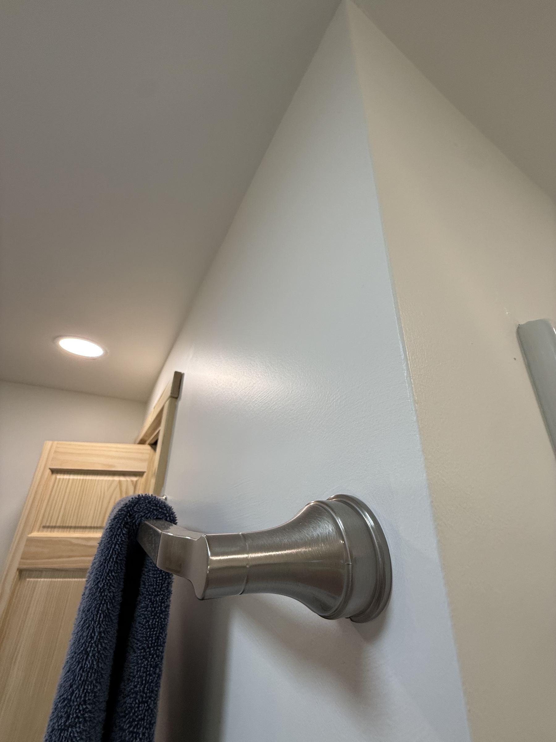 Bathroom remodel towel bar hardware detail
