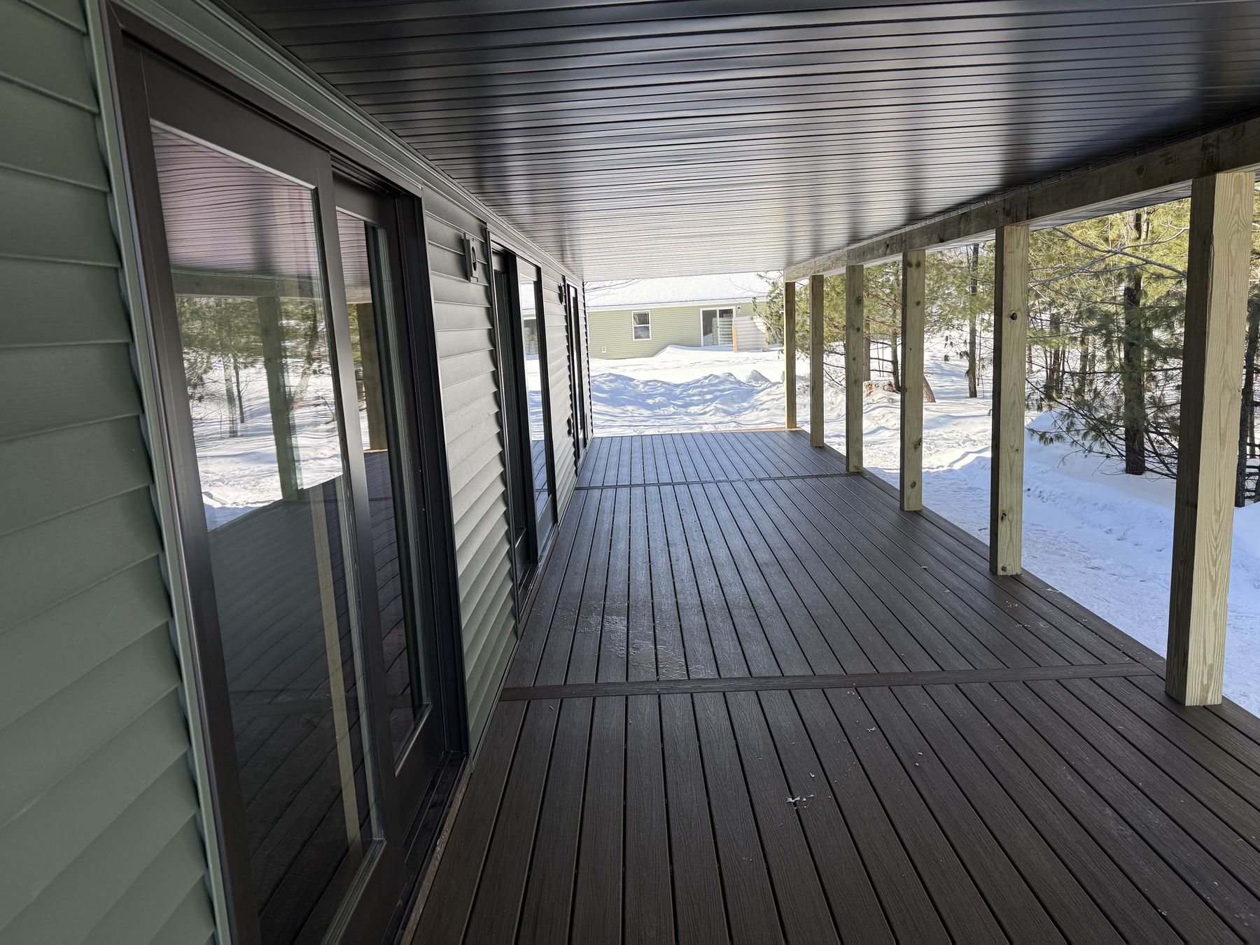 Covered porch addition built by Double J Custom Builders