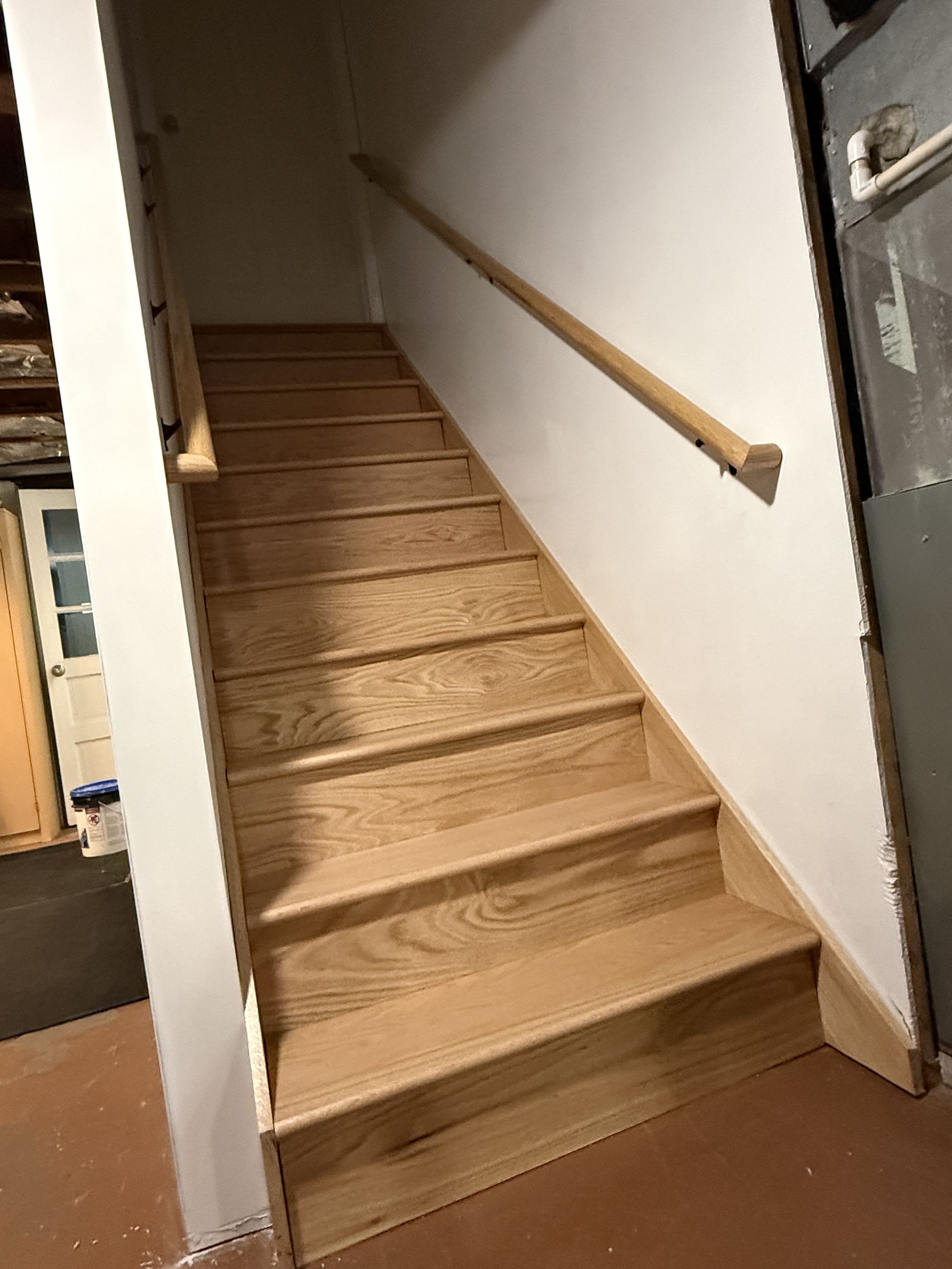 Finished custom staircase with handrail